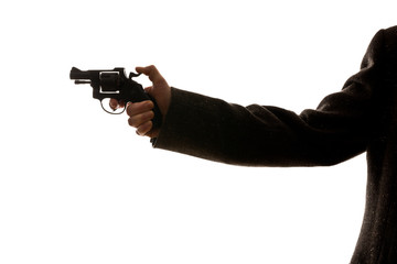 man shooting a handgun