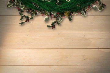 Composite image of festive christmas wreath