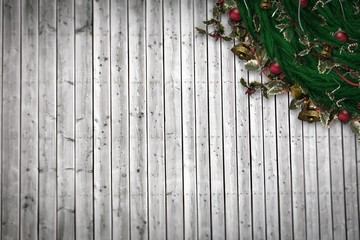 Composite image of festive christmas wreath with decorations