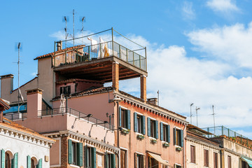 Naklejka premium Linen drying on the terrace of the old house in Italy