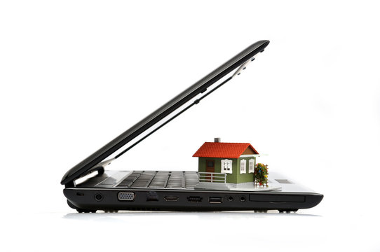 Side View Laptop and House