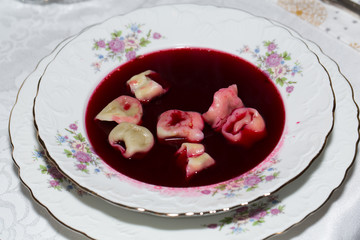 Red borscht with mushroom ravioli