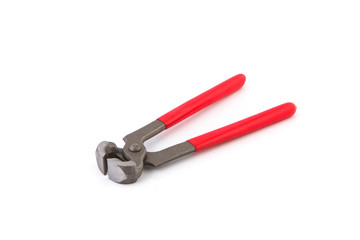 Crimper tool with a red handle.