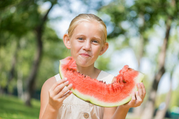 Kid with watermelon slice