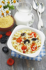 Millet porridge with dried apricots and prunes