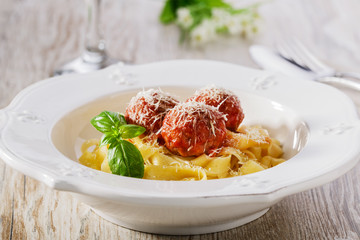 Pasta with meatballs and parmesan cheese