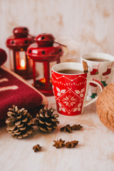 Christmas still life with XMAS letters, tea and present 