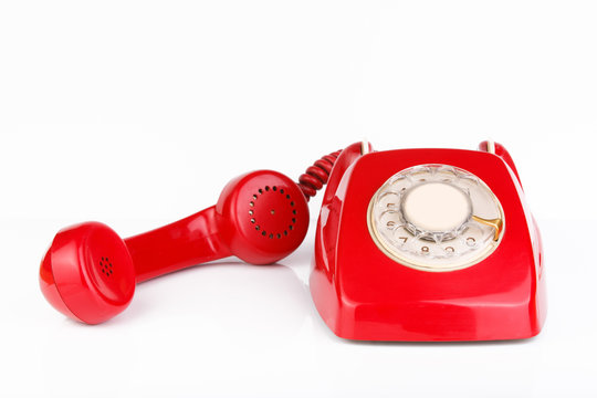 Red Telephone On White Background.