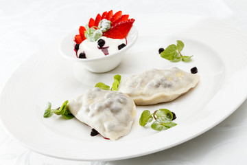 blueberry dumplings with sauce