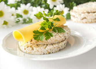 Rice cakes with cheese, parsley and chamomile