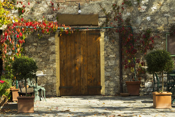 Picturesque building facade and entrance in a town from Tuscany