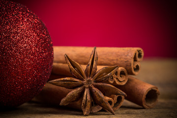 Close up of cinnamon sticks and star anise on wood