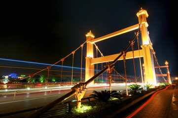 Fototapeta premium Lizhe bridge at night in Guilin, Guangxi, China.