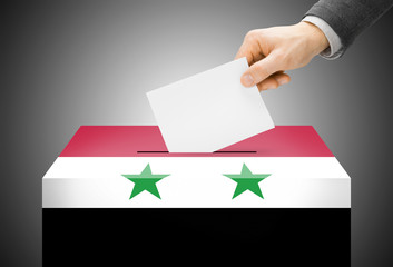 Ballot box painted into national flag colors - Syria