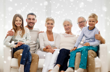 happy family sitting on couch at home