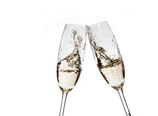 Toasting with champagne glasses on white background