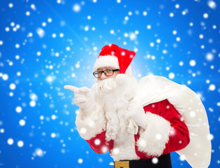 man in costume of santa claus with bag
