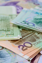 chinese Yuan banknotes (renminbi)  for money and business  conce