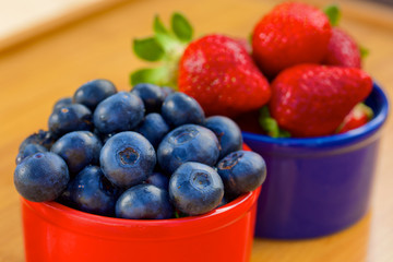 Blueberry and strawberry in cans