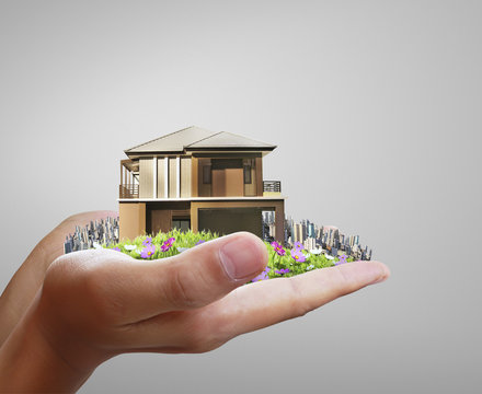 House model concept in  hand
