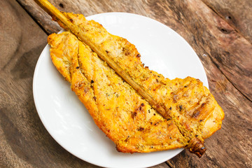 Grilled chicken with turmeric.