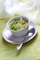 Pea soup with toasted almonds