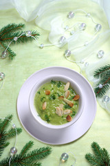 Christmas pea soup with toasted almonds - obrazy, fototapety, plakaty