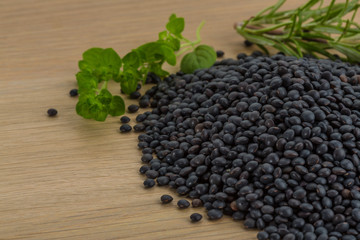 Raw black lentils
