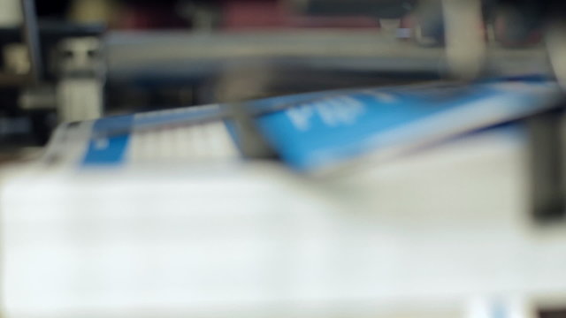 The machine works at the printing house