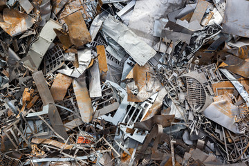 ferrous scrap and mechanisms of various sizes seen from above.