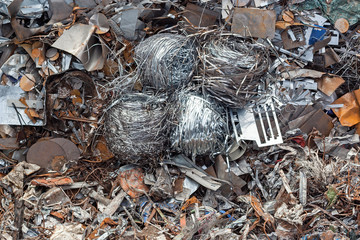 ferrous scrap and mechanisms of various sizes seen from above.