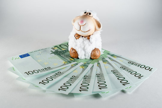 toy sheep on banknotes 100 euro