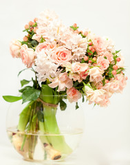 beautiful fresh pink flowers in glass vase