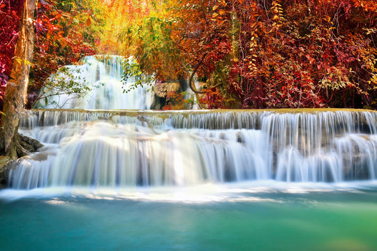 Beautiful waterfall in autumn forest © totojang1977