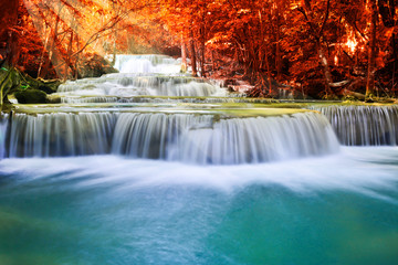 Beautiful waterfall in autumn forest