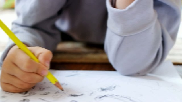 Children draw in home