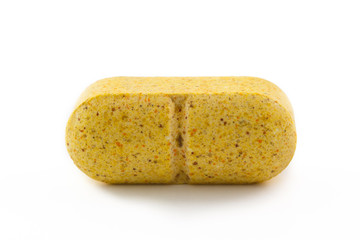 Close up yellow pill