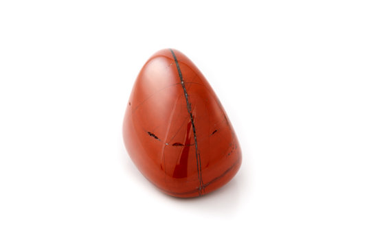 Red jasper close up white background