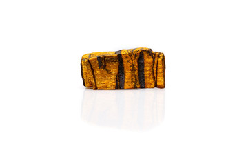 Tiger's eye gem stone rough isolated white