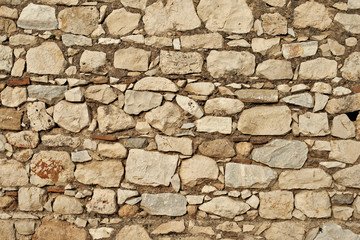 Pattern of old stone wall, surfaced