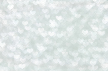 defocused abstract white hearts light background