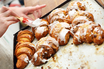 Fresh croissants iced with delicious cream