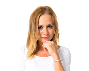 Woman thinking over isolated white background
