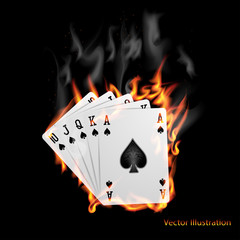 Poker cards burn in the fire.