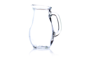 empty carafe of milk isolated on white background with reflectio