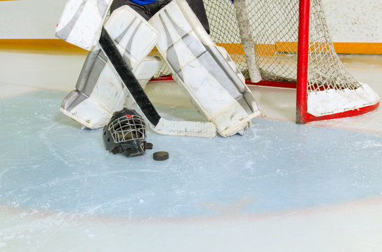 Hockey Goalie In Crease Getting Ready