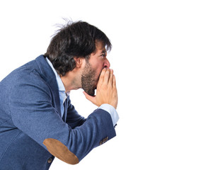 Fototapeta premium Businessman shouting over isolated white background