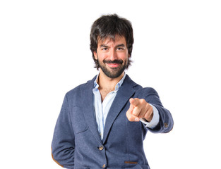 Man pointing to the front over white background
