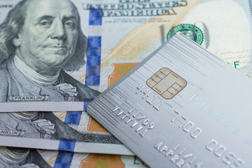 Credit Card on dollar bills as wealthy concept
