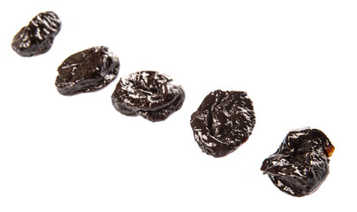 Dried plum or prune over white background